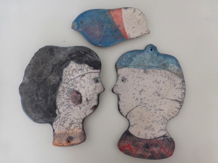 2 raku face plates and raku bird plate